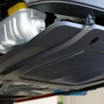 How to Remove Plastic Holding Underbody of Car